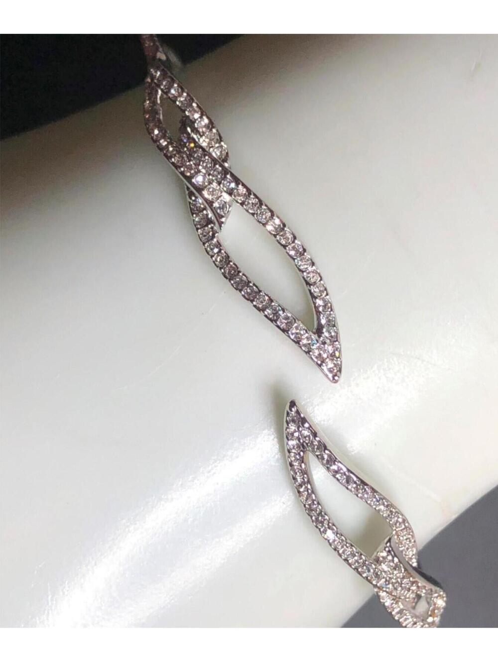 7385 Eliot Danori Silver tone CZ  Swirled leaf hinged cuff bracelet 7"